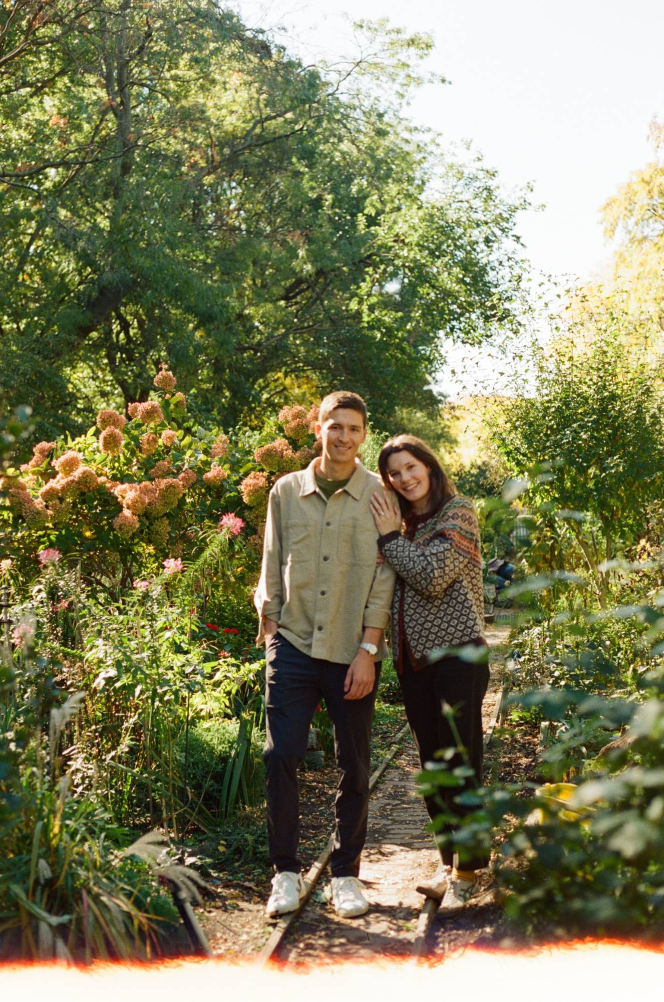 Madison and Tony in a garden